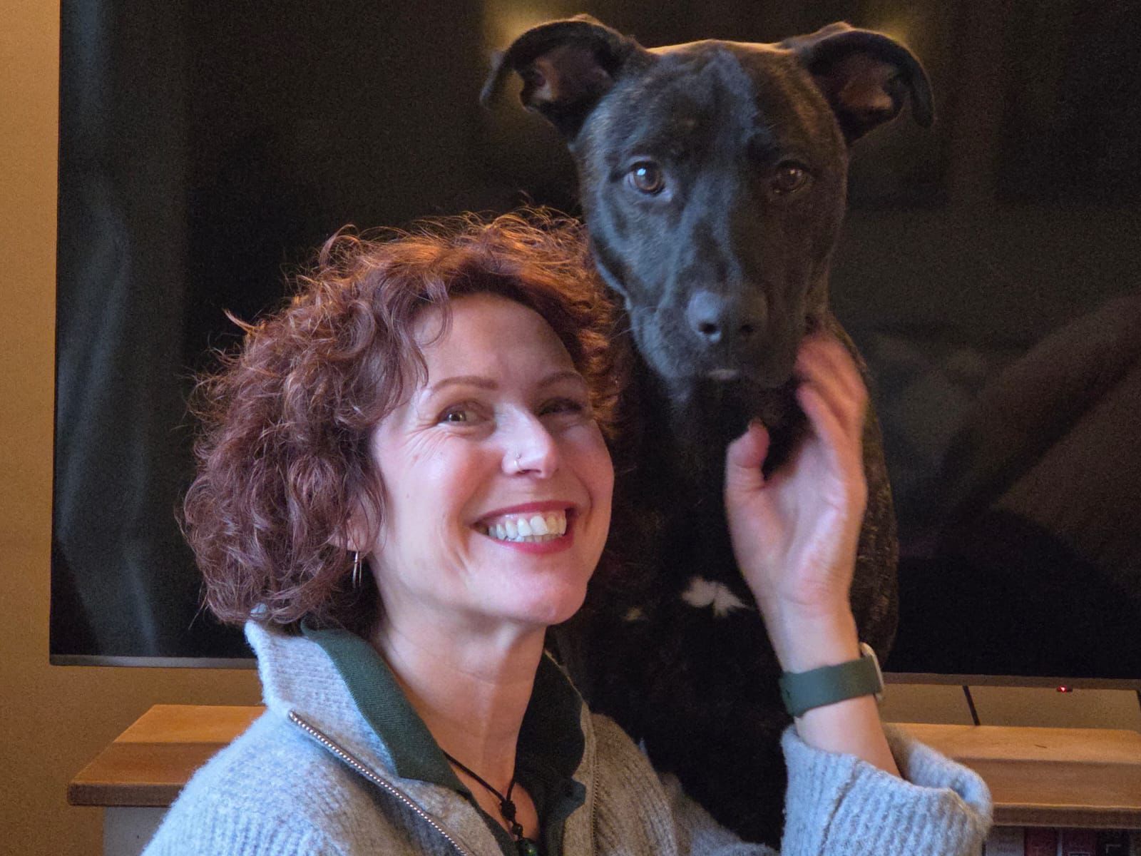 Joe Bailey Humanimal Trust CEO with a black dog dog